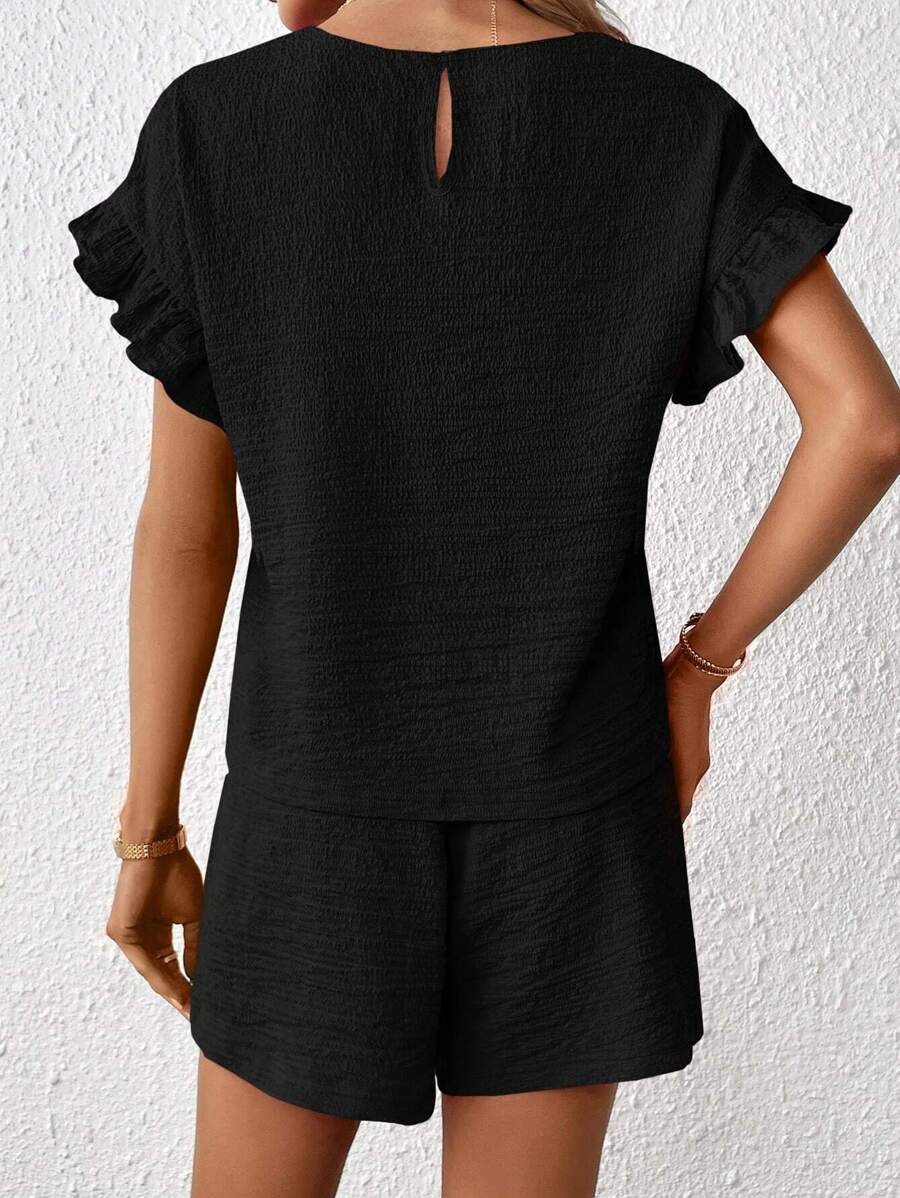 Britt | Casual set met rimpeling en knoopdetails