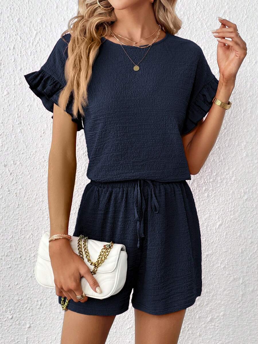 Britt | Casual set met rimpeling en knoopdetails