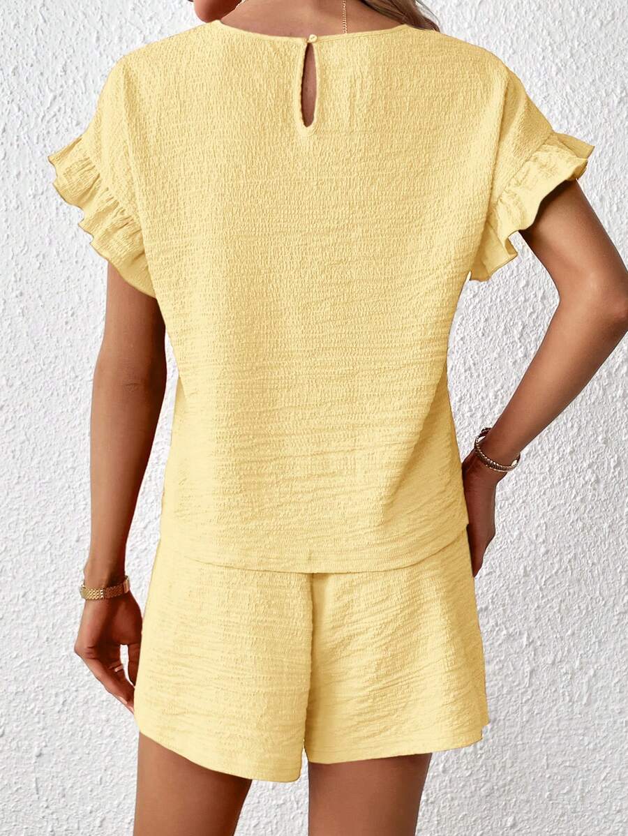 Britt | Casual set met rimpeling en knoopdetails