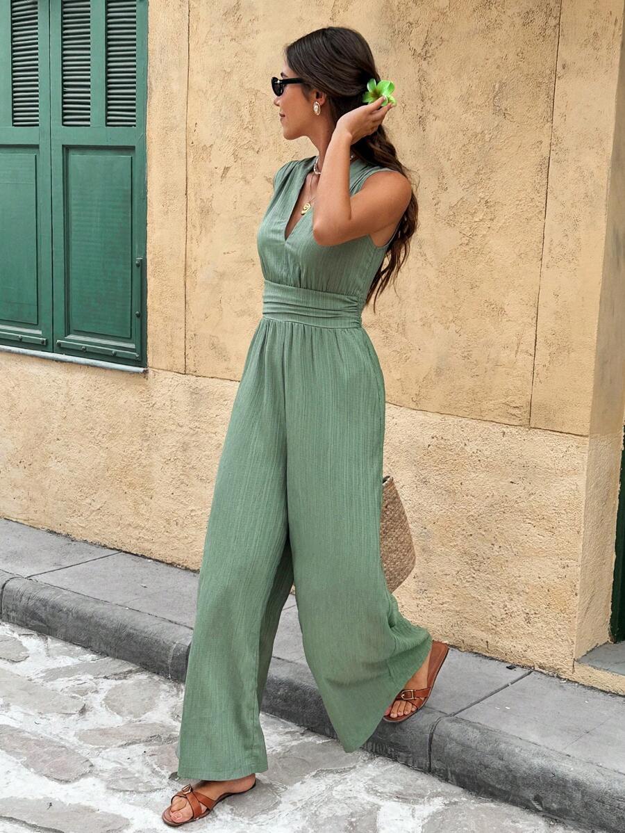 Marga | Effen jumpsuit met diepe V-hals en gerimpelde mouwen