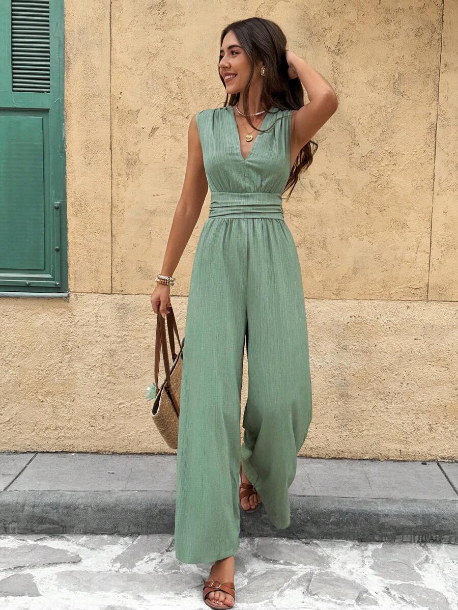 Marga | Effen jumpsuit met diepe V-hals en gerimpelde mouwen