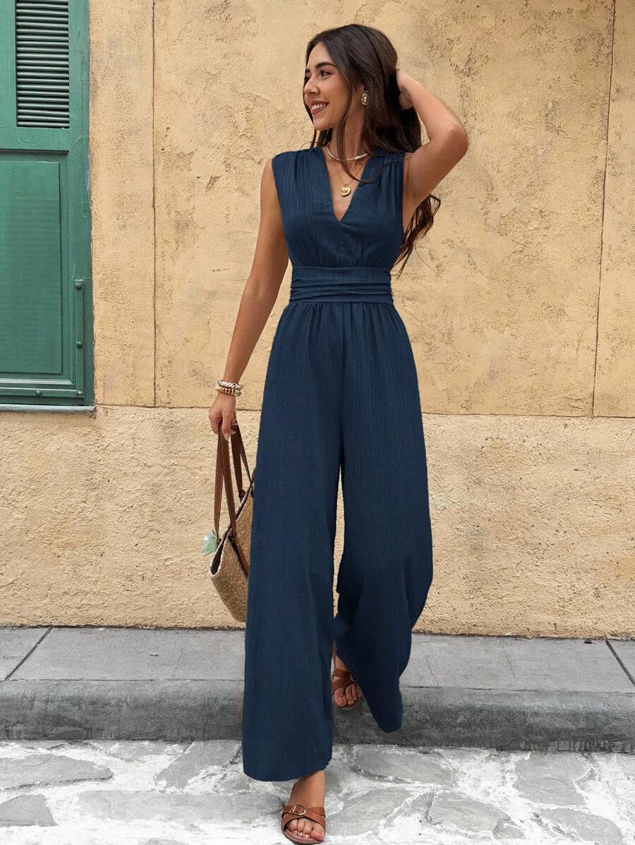 Marga | Effen jumpsuit met diepe V-hals en gerimpelde mouwen