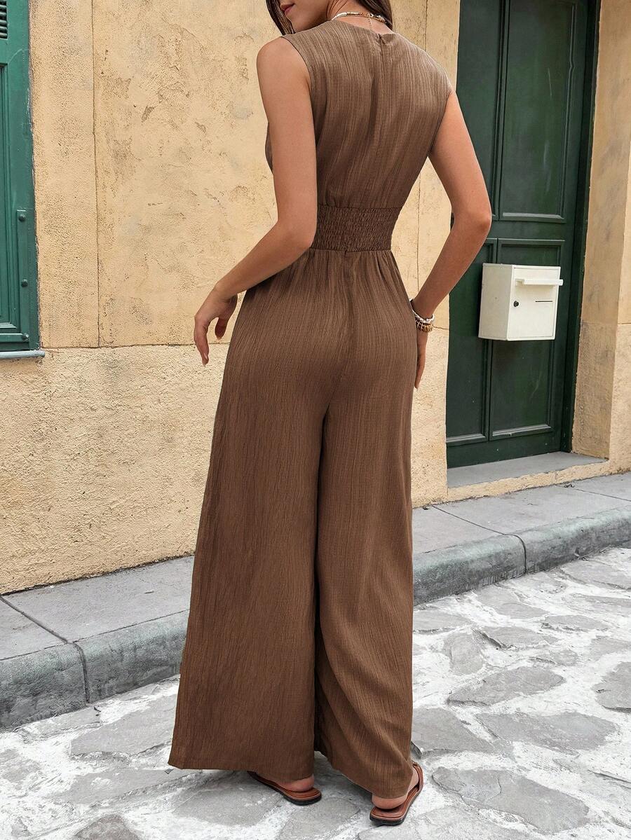 Marga | Effen jumpsuit met diepe V-hals en gerimpelde mouwen