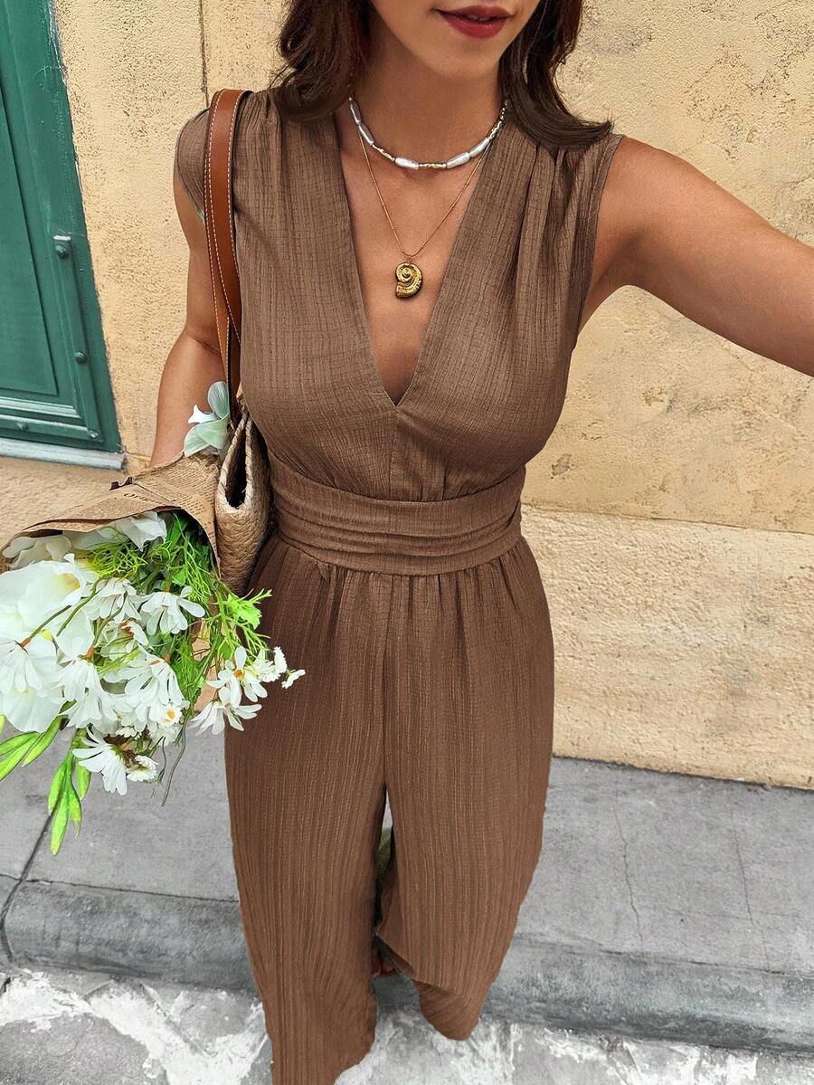 Marga | Effen jumpsuit met diepe V-hals en gerimpelde mouwen