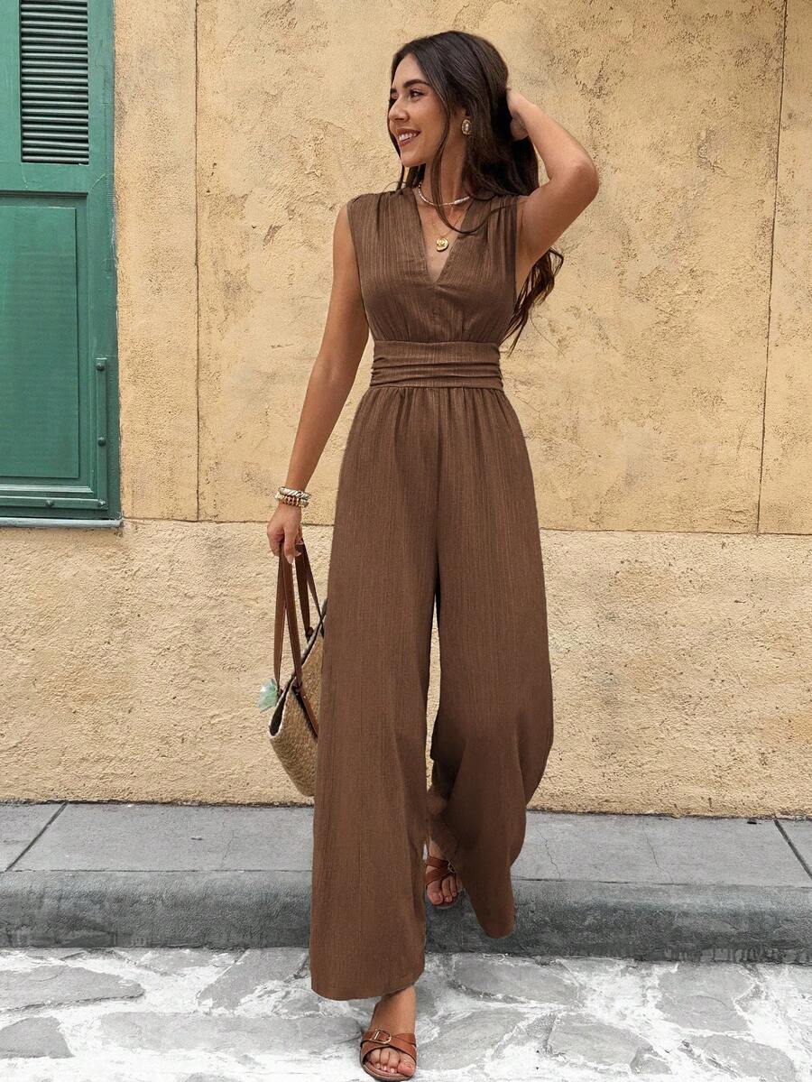 Marga | Effen jumpsuit met diepe V-hals en gerimpelde mouwen