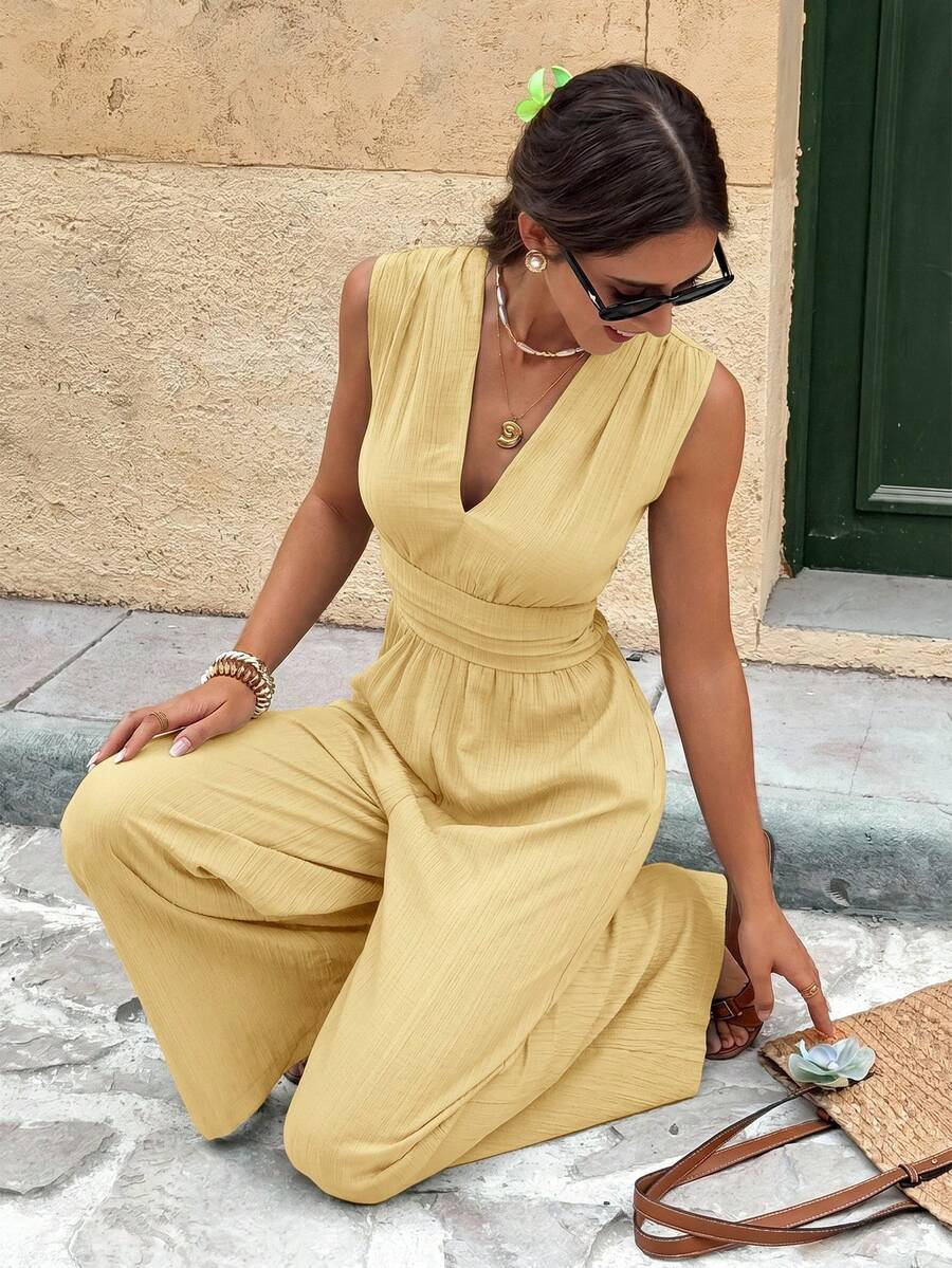 Marga | Effen jumpsuit met diepe V-hals en gerimpelde mouwen