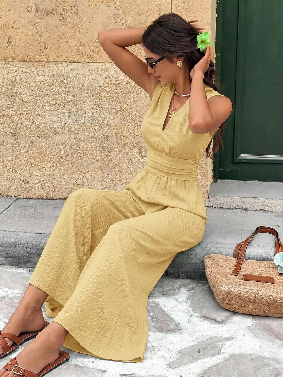 Marga | Effen jumpsuit met diepe V-hals en gerimpelde mouwen
