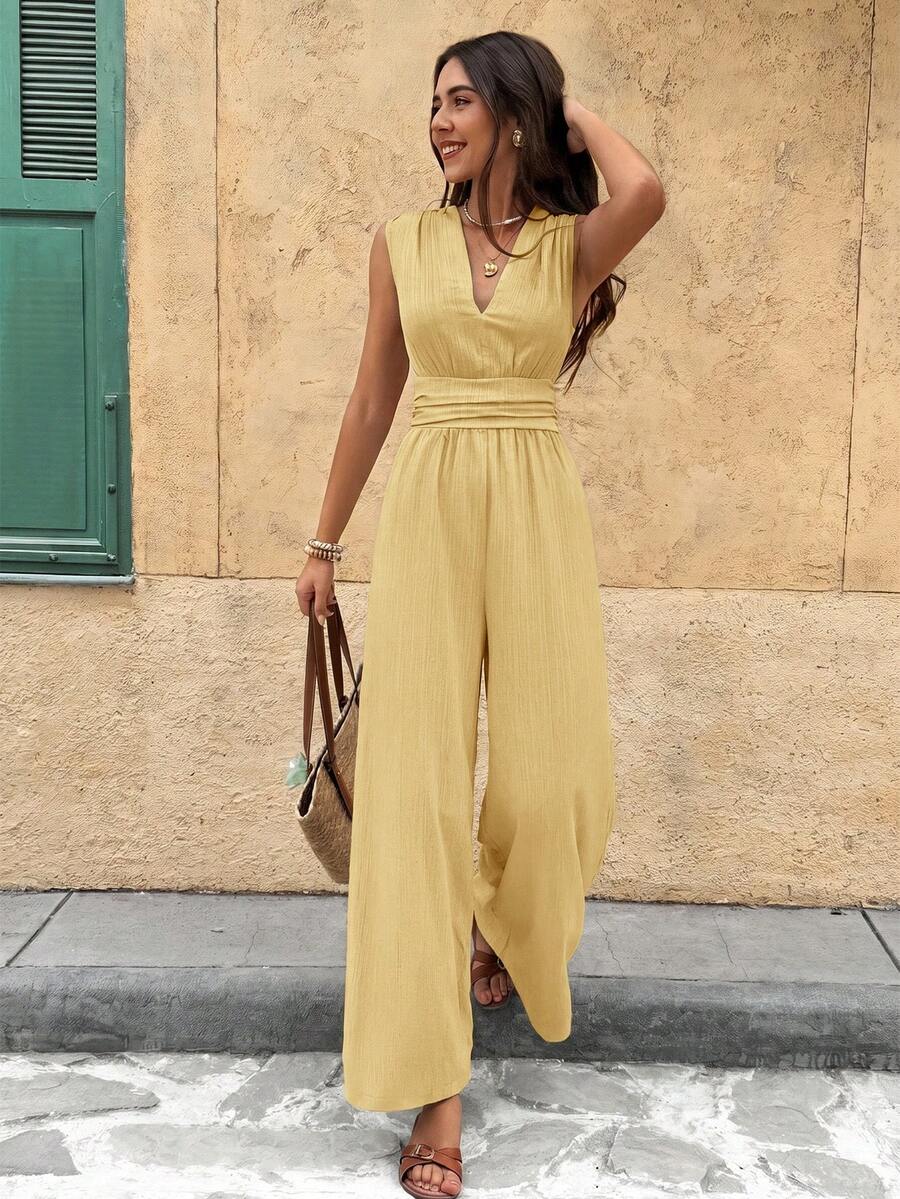 Marga | Effen jumpsuit met diepe V-hals en gerimpelde mouwen