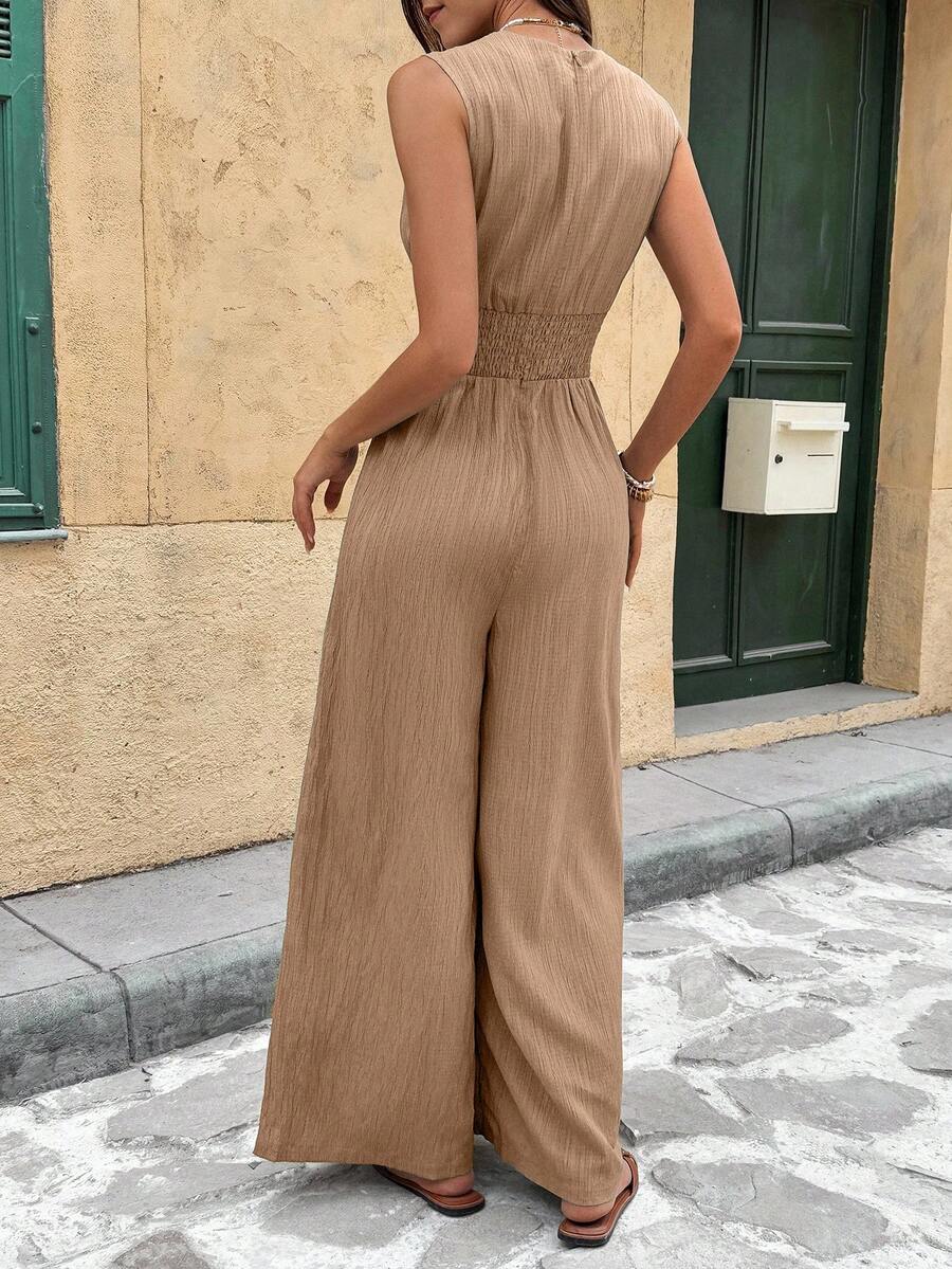 Marga | Effen jumpsuit met diepe V-hals en gerimpelde mouwen